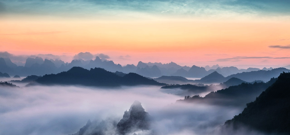 I set my gaze on the fog. Like a bridal veil, it obscured the beauty of the mountains hidden beneath its lacy fingertips.
